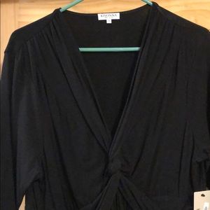 Black 3/4 sleeve knit shirt.  Kiyonna Brand